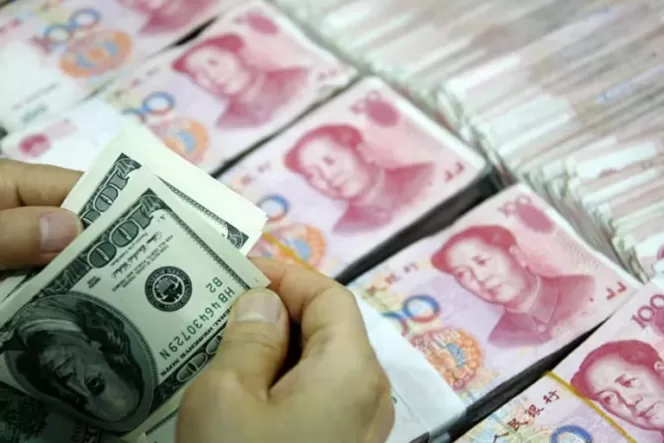 
 US Dollar vs Renminbi Yuan. (STR-AFP)